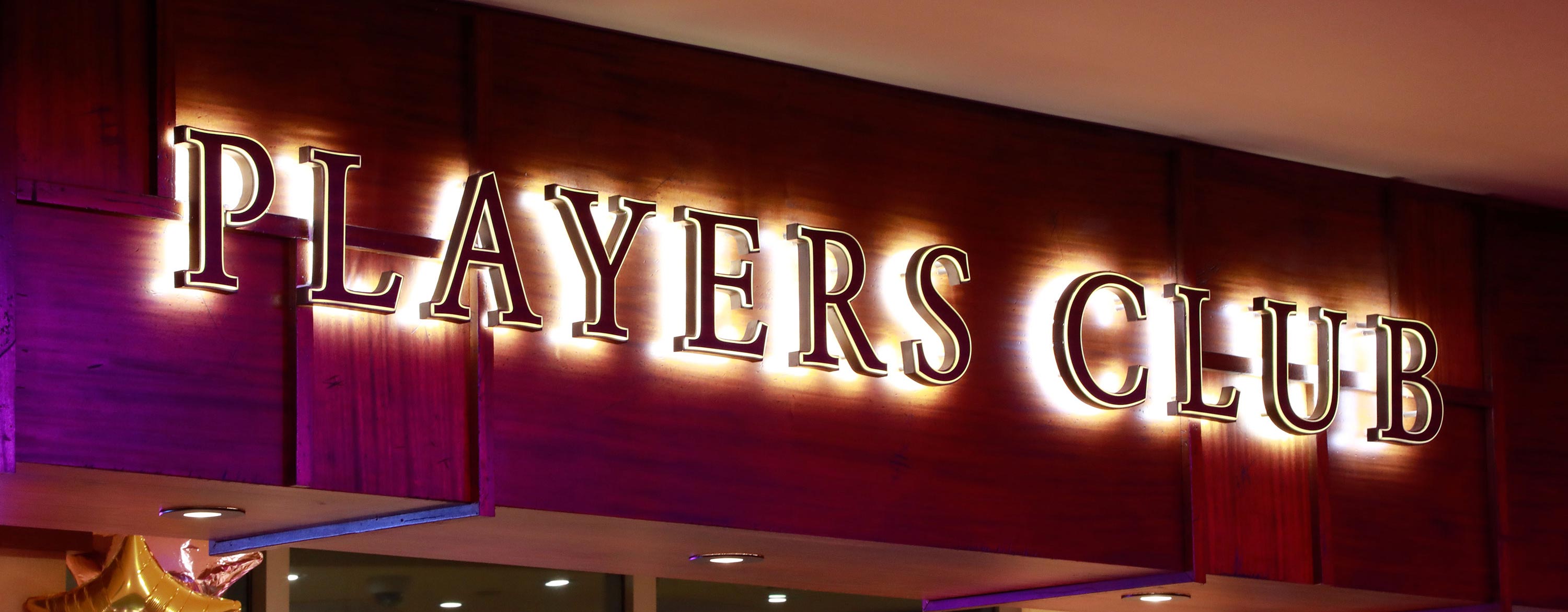 The Players Club sign